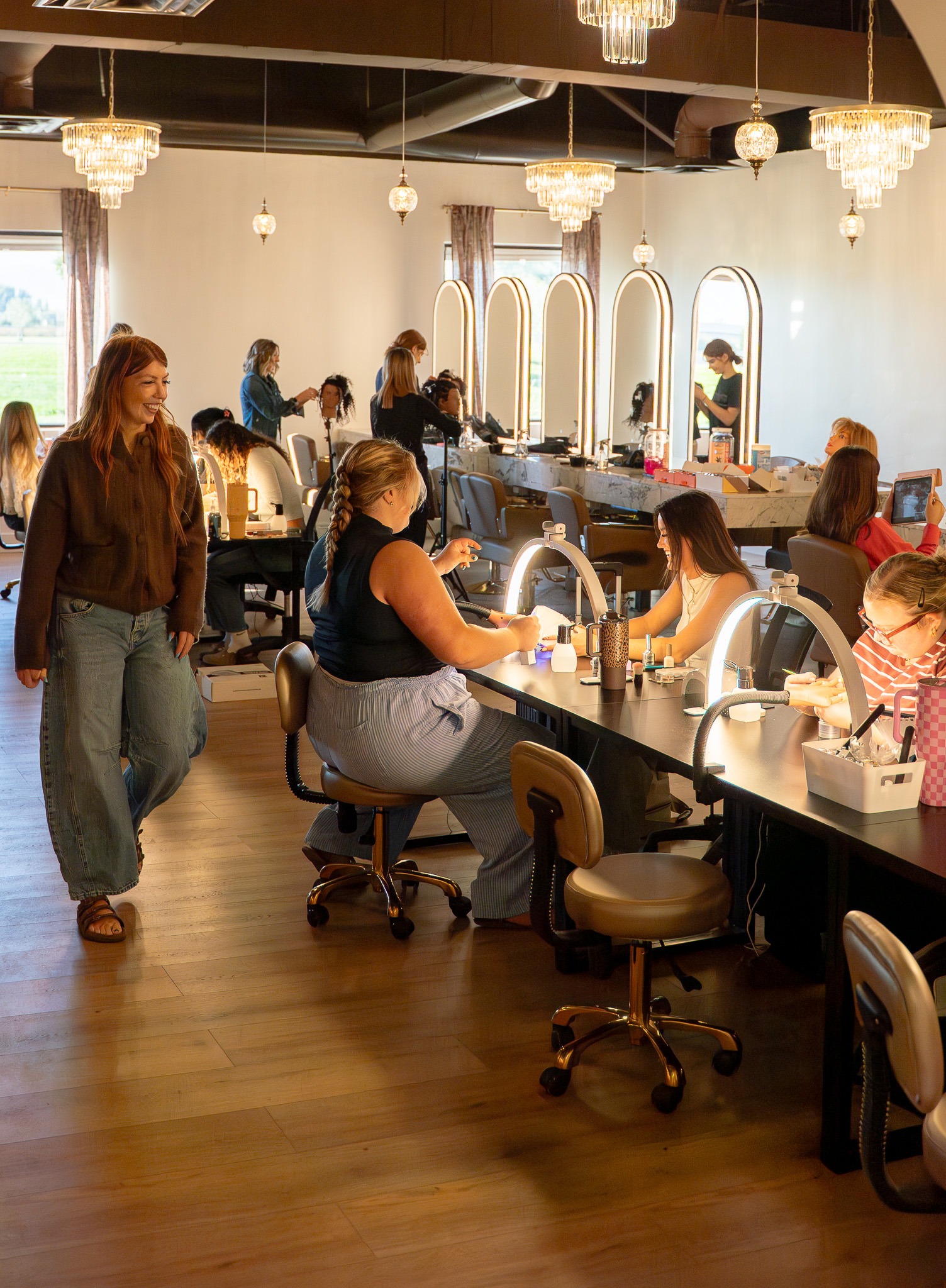 Students learning together in the Cambria Academy salon