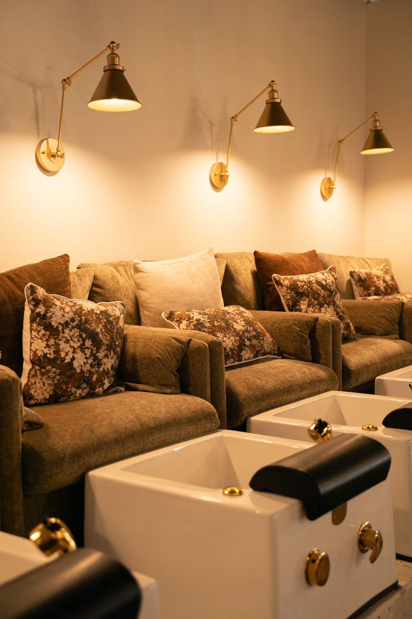 Comfortable pedicure seating and basins at Cambria Academy
